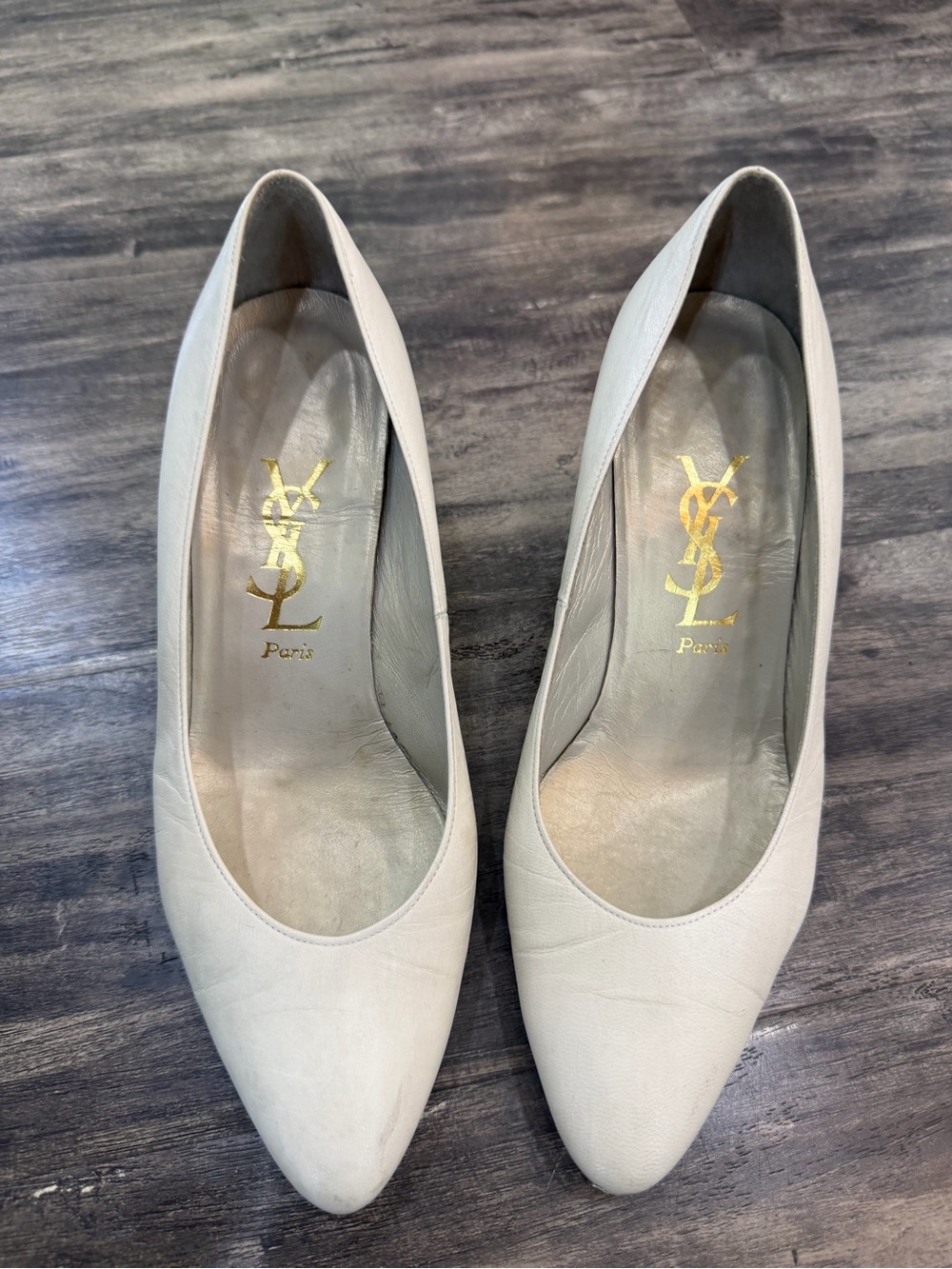 Saint Laurent Ivory Leather Pointed-Toe Pumps with Gold Logo